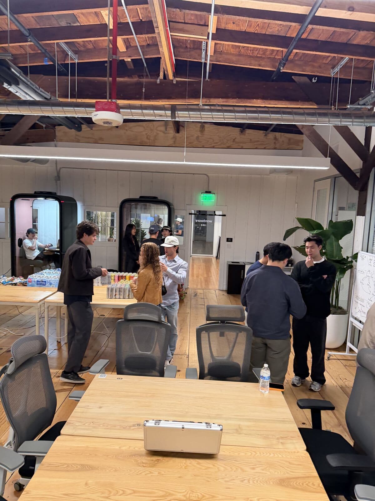 Guests arriving and grabbing drinks