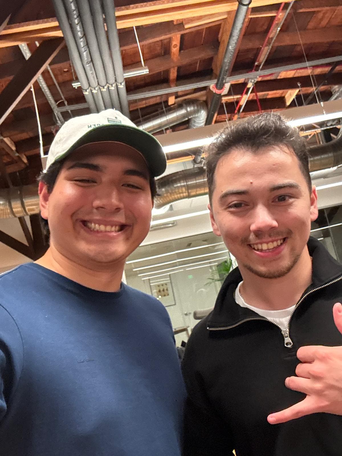 Two guests smiling for a selfie
